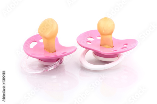 Photo: two dummys on white isolated background two dummys on white isolated background