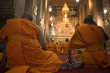 Photo: Praying buddhist monks Praying buddhist monks