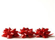 three red gift bows
