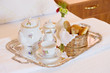 Breakfast tray laying on white bed Breakfast tray laying on white bed