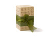 Gift box in asian style with hierogliphs and green ribbon. Path