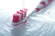 water splashing over toothbrush