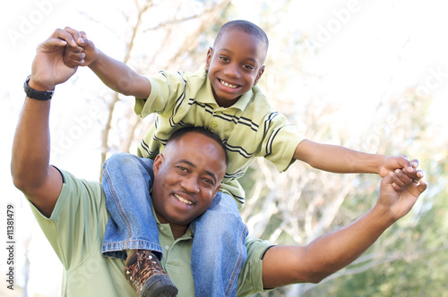 Photo: Man and Child Having Fun Man and Child Having Fun