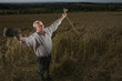 Farmer standing in field