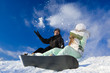Photo: Couple having fun on snowboard Couple having fun on snowboard