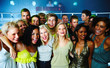 Group of friends standing together in a nightclub