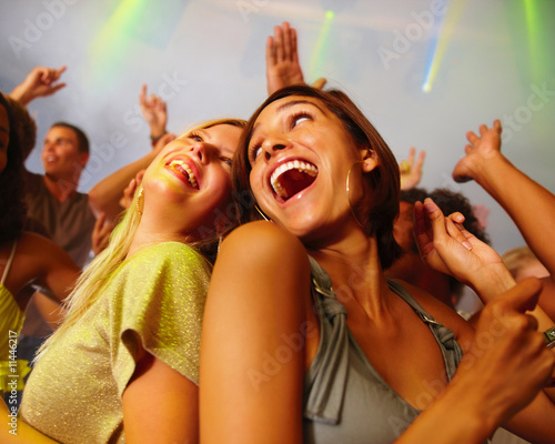 Photo: Laughing young women enjoying themselves Laughing young women enjoying themselves