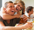 Smiling young guys laughing joyfully Smiling young guys laughing joyfully