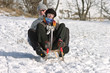sledding in the snow