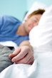 Man asleep in bed