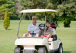 Father and Son in Golf Cart Father and Son in Golf Cart