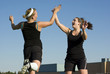 Soccer Girls celebrate with a high five Soccer Girls celebrate with a high five