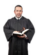 Judge holding the gavel and book Judge holding the gavel and book