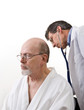 Doctor Examining Senior Male Patient