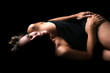 low-key picture of sexy woman lie on floor