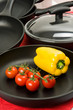 Still-life with fry pans and vegetables