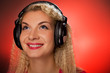 Blond woman listening to the music