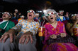 Movie audience in 3D glasses, making faces, low angle view