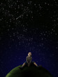 Boy looking at stars