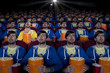 Cloned audience watching movie in theater
