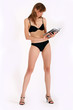 woman in bikini reading