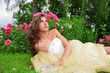princess lying under rosebushes