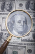 magnifier with money close up magnifier with money close up