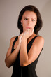 Photo: Beautiful woman on gray background Beautiful woman on gray background