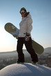 Woman holding snowboard
