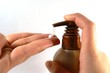 Squeezing the cream out of dispenser with pump