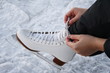 tying laces on figure skates