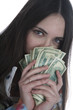 woman holds cash