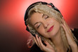 Blond woman listening to the music