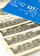 credit card and dollars
