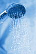 water flowing from metal shower