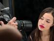 Pretty female model on photo shooting in studio Pretty female model on photo shooting in studio