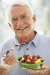 Senior Man Eating Fresh Fruit Salad Senior Man Eating Fresh Fruit Salad