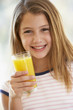 Young Girl Drinking Orange Juice Young Girl Drinking Orange Juice