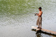 boy fishing with spinning on stage