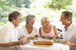 Photographie : Friends Eating An Al Fresco Lunch