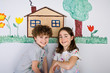 Kids painting on wall