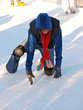 child learning ice skating
