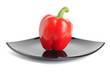 Red pepper on a black plate