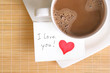 a love note with a cup of coffee