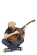 casual man playing his acoustic guitar seated casual man playing his acoustic guitar seated