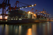 Containerschiff bei Nacht, Logistik, Transport
