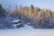 Small wooden house in winter forest Small wooden house in winter forest