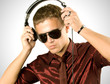Boy is is listening to music track