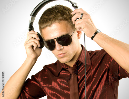 Photo: Boy is is listening to music track Boy is is listening to music track