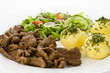 Grilled meat with boiled potatoes, sauce and vegetable salad